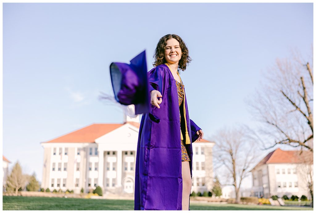 Meg in Cap and Gown on James Madison University Campus